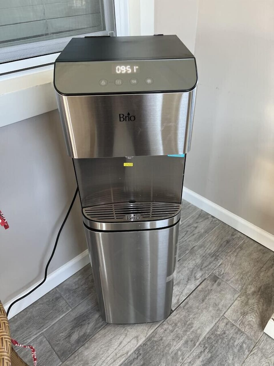 Reverse osmosis water filtration system located on shared front porch.