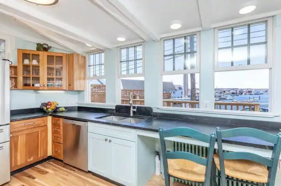Sit at the breakfast bar and watch the spectacular sunsets over the harbor
