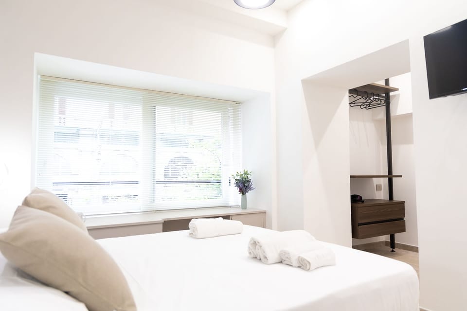 Deluxe Room, Multiple Beds, City View | Egyptian cotton sheets, premium bedding, down comforters, in-room safe