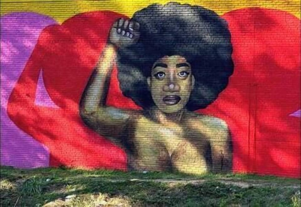 The neighborhood is full of street art. (1)