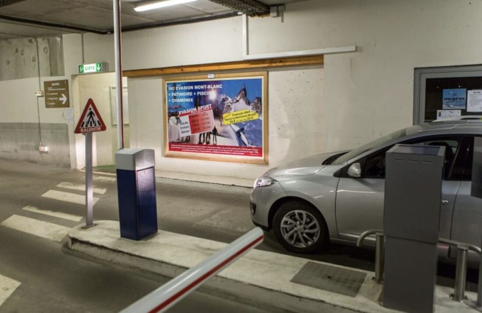 One parking space in the condominium's parking lot (unassigned) and a private spot in the "Rochebrune" underground parking.