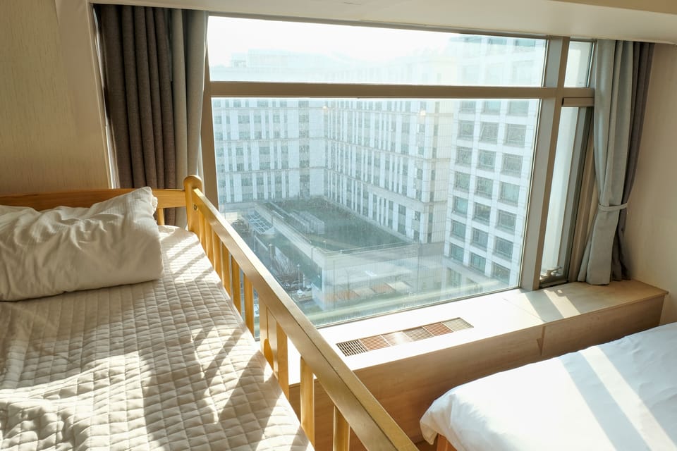 Family Room A (1Queen 150*200cm & 2Sinlge 110*200cm & 1bunk bed) | Blackout drapes, free WiFi