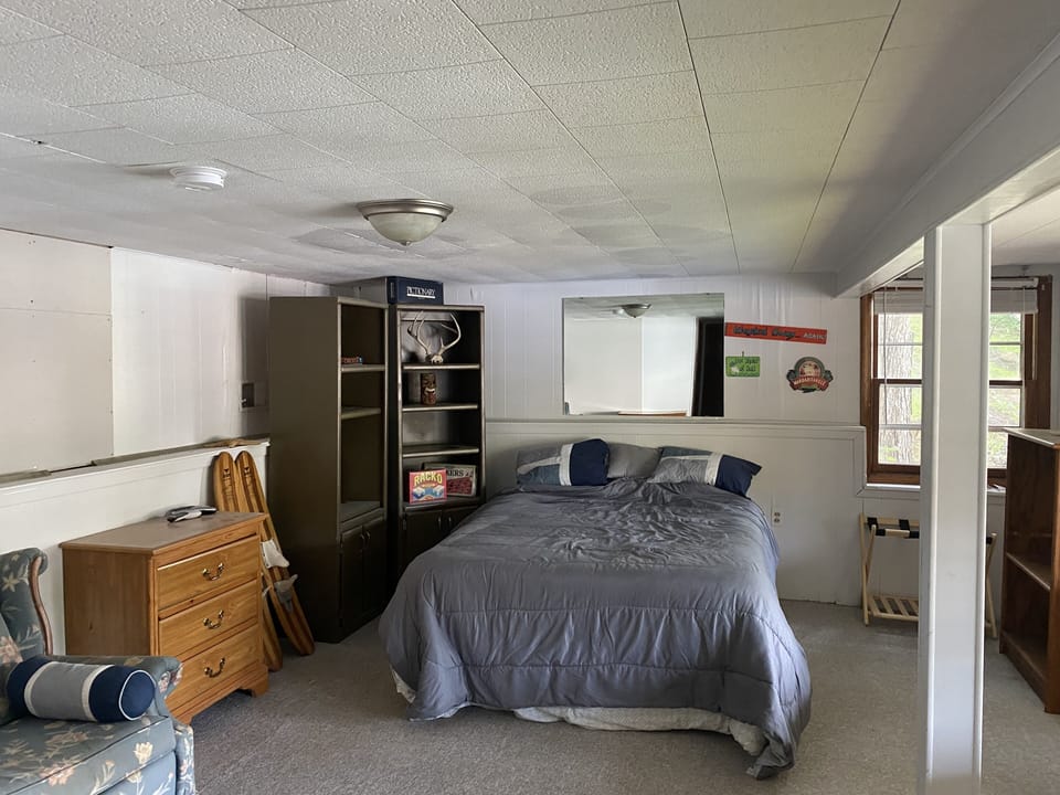 Access to the fourth bedroom in the lower level is from outside on the deck. 