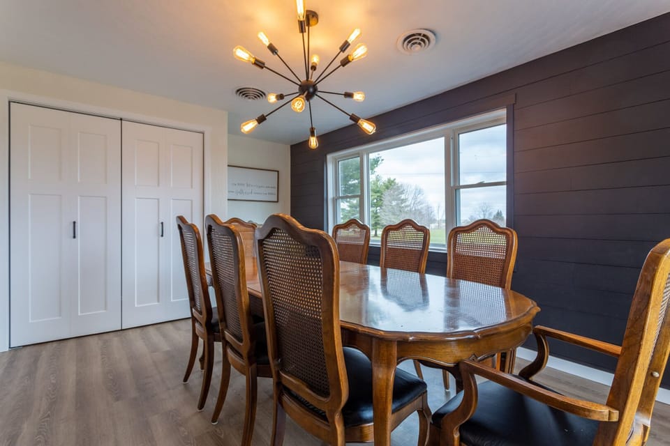 Dining room with 8 chairs. Laundry is located in the closet: Washer and Dryer.
