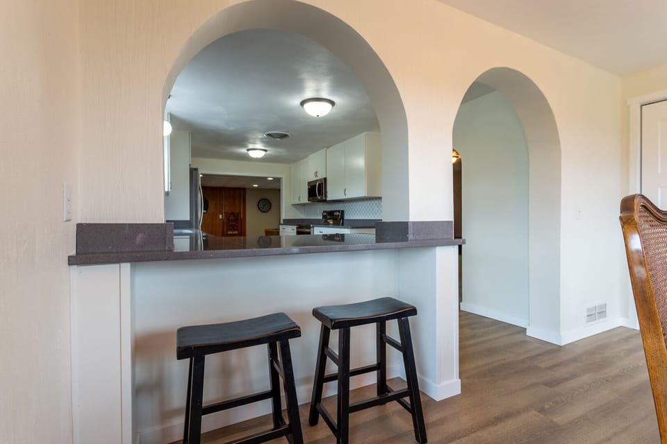 Dining room has two island seats.