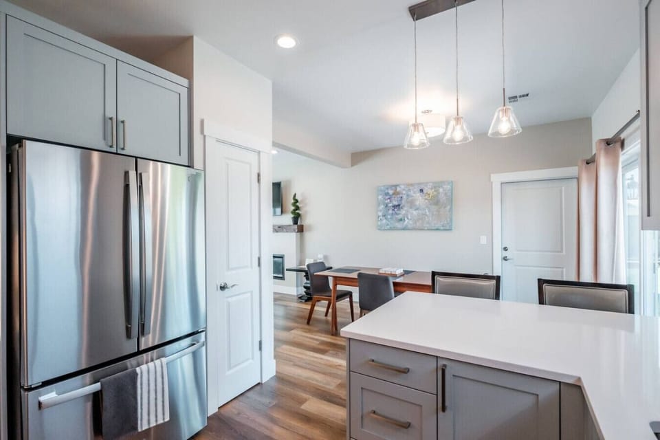 Enjoy a newly built home with modern appliances and seating for two at the kitchen counter.