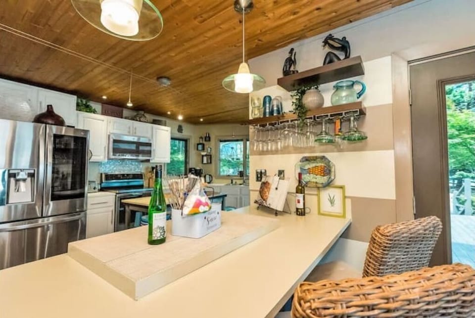 The kitchen is spacious and well stocked.