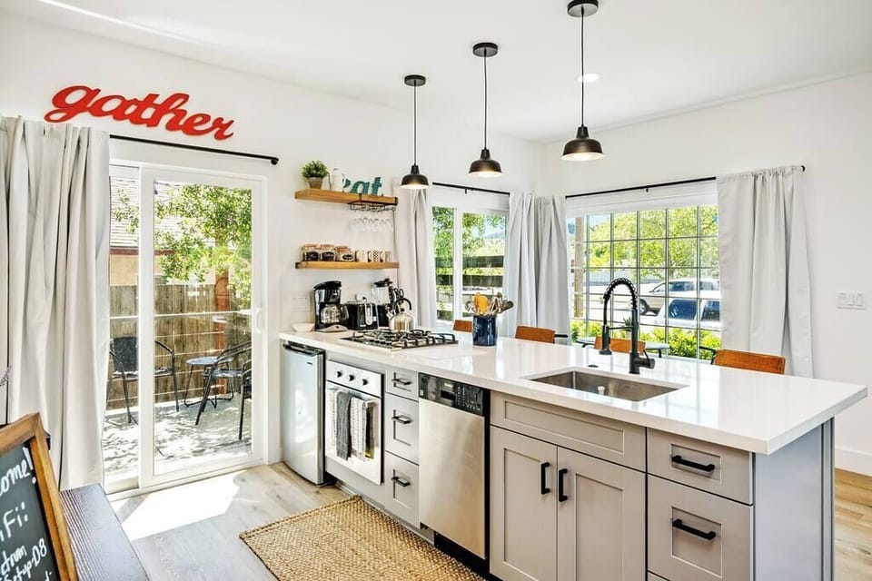 newly remodeled kitchen, 4 burner stove, oven, dishwasher and mini fridge