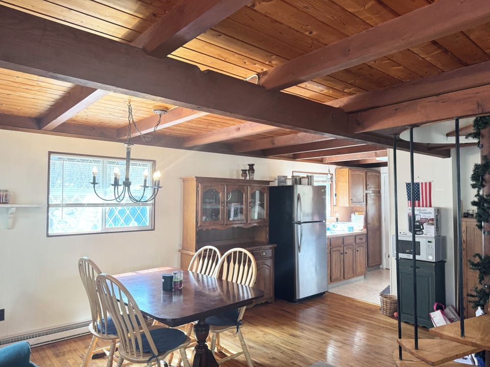 Open floor plan connects living, dining, and kitchen areas