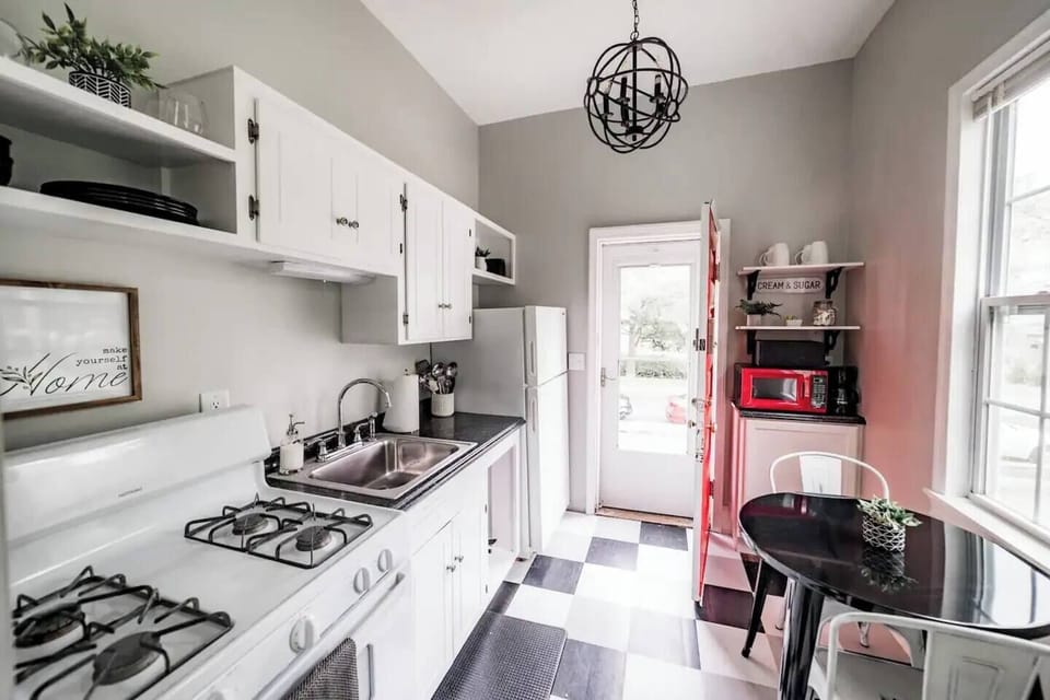 Full kitchen. On street parking in front of the private entrance.