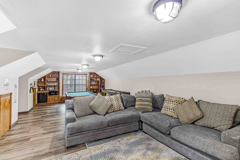 large couch in game room