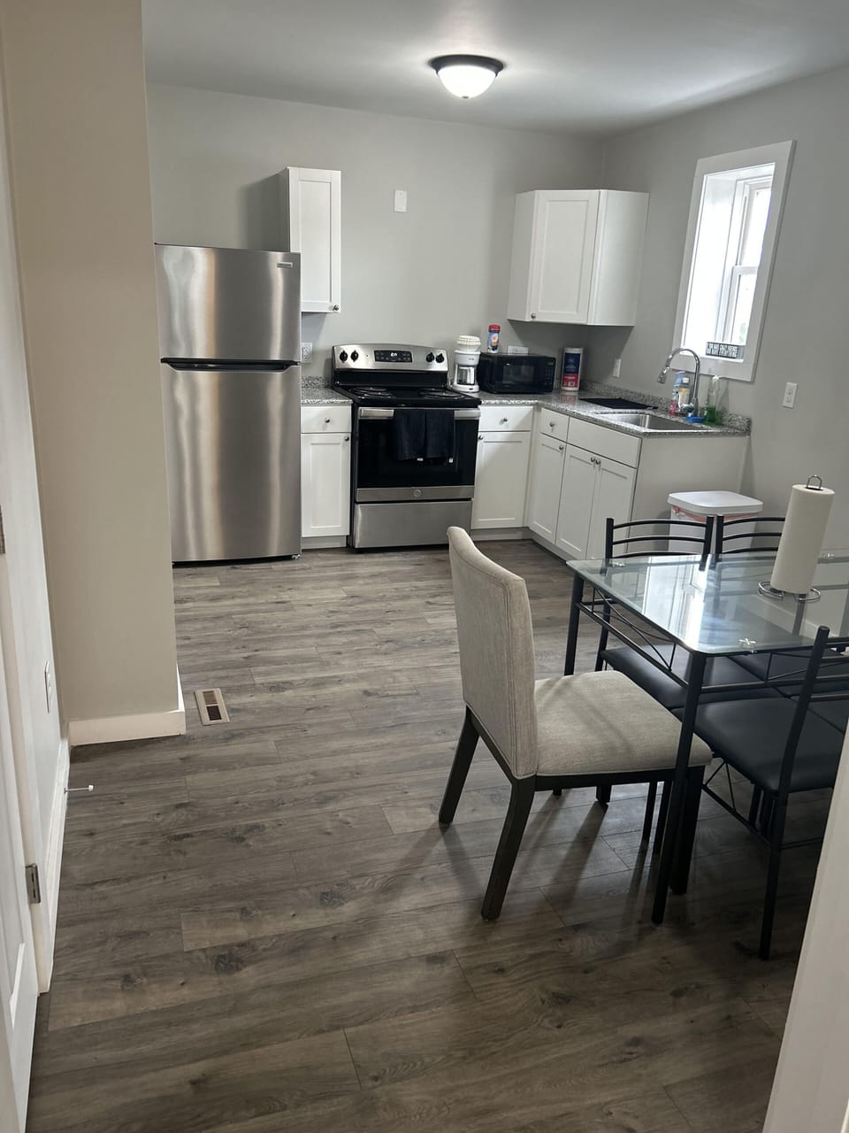 A full zoom-out of the kitchen, larger than photos depict + Large closet/pantry