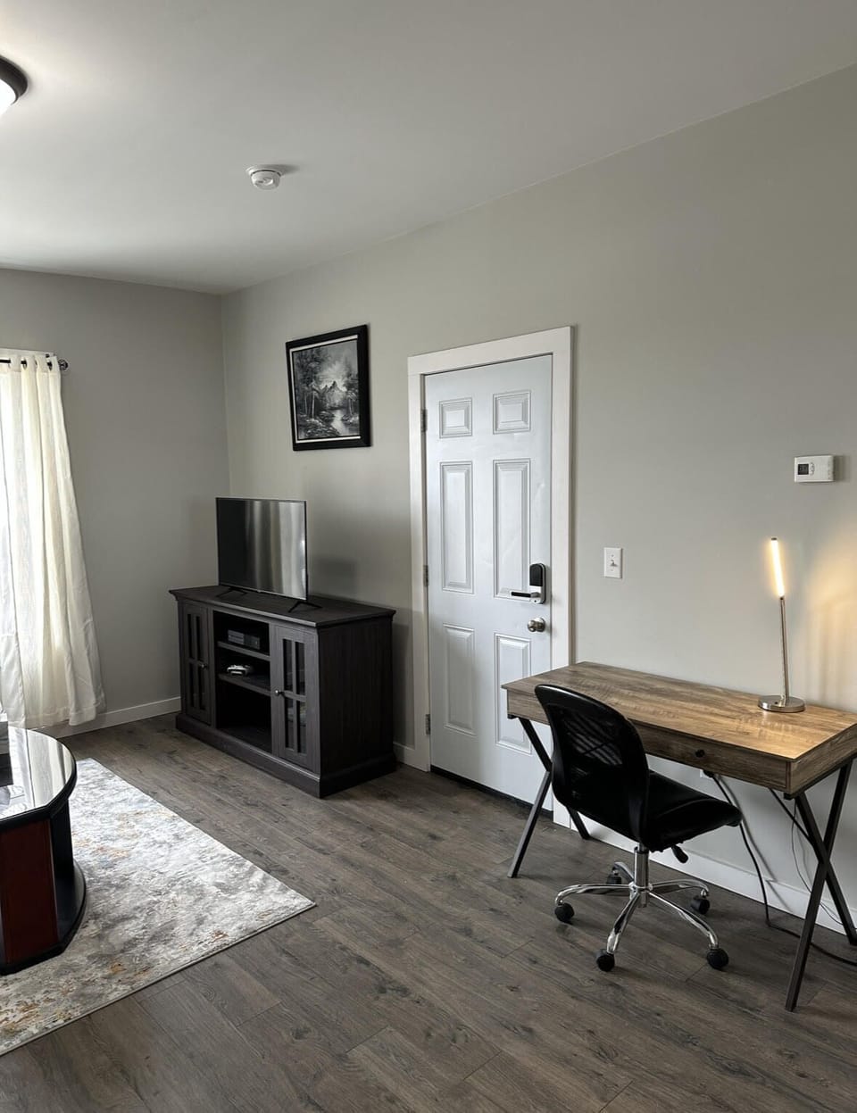 A dedicated workspace in the living room that can be soaked by natural light