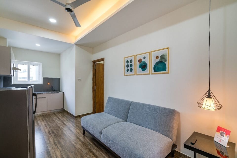One Bedroom Suite | Living area | 32-inch LCD TV with digital channels, TV