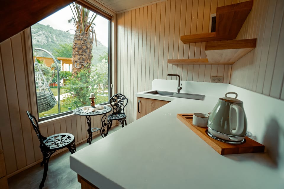 Luxury Duplex, Multiple Beds, Jetted Tub, Pool View | Private kitchen | Electric kettle, highchair