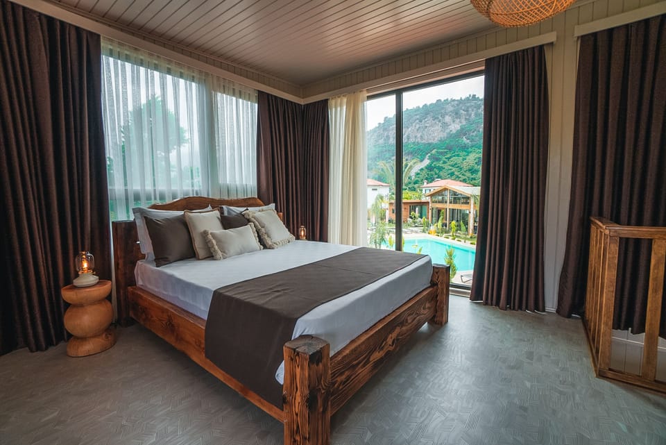 Luxury Duplex, Multiple Beds, Jetted Tub, Pool View | Premium bedding, minibar, individually decorated, individually furnished