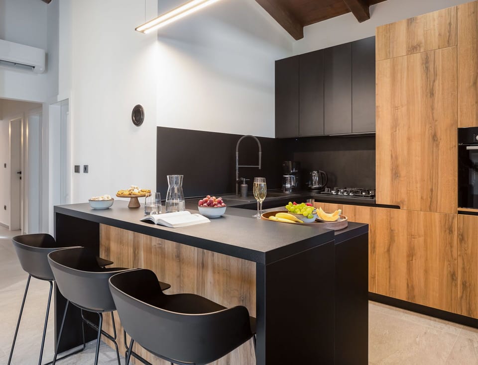 Villa | Private kitchen | Fridge, microwave, oven, stovetop
