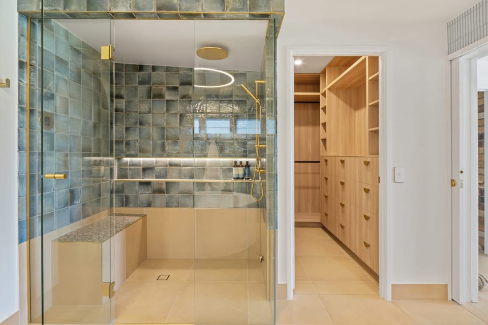 Enjoy a spa like experience in the luxurious ensuite with walk in steam shower
