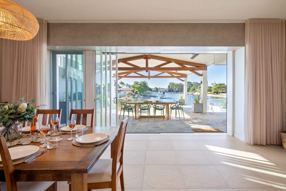 The home features stacking doors for an indoor, outdoor flow
