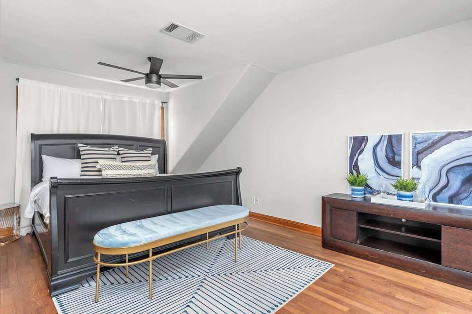 Nights of bliss, mornings of joy: Our bedroom's comfortable bed and soft linens set the stage for peaceful slumber and waking up feeling revitalized. Step into a world of rest and rejuvenation.