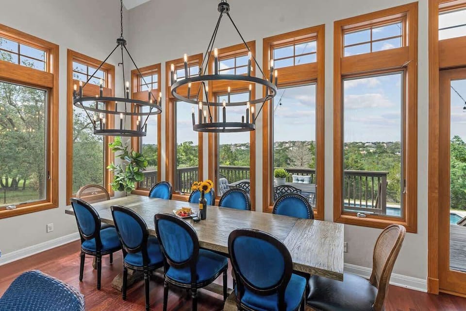 Feast and connect: Our large 10-person dining table seamlessly opens to the kitchen, making every meal a delightful experience filled with laughter, love, and the joy of shared moments.
