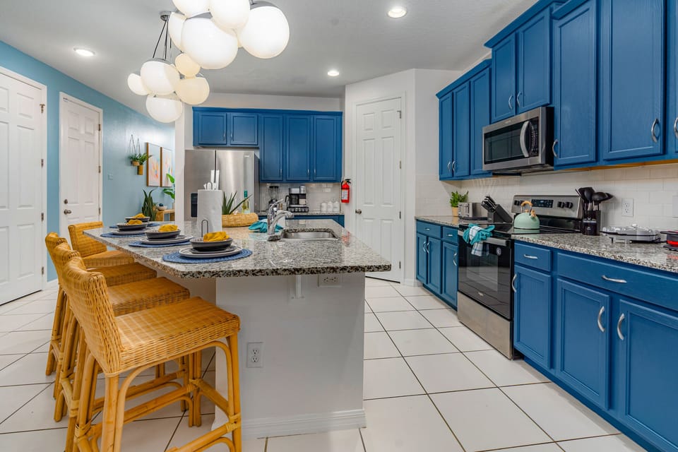 This open colorful kitchen inspires fun!