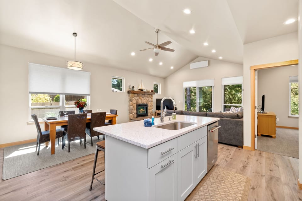 Breakfast bar island open to the dining and living area.