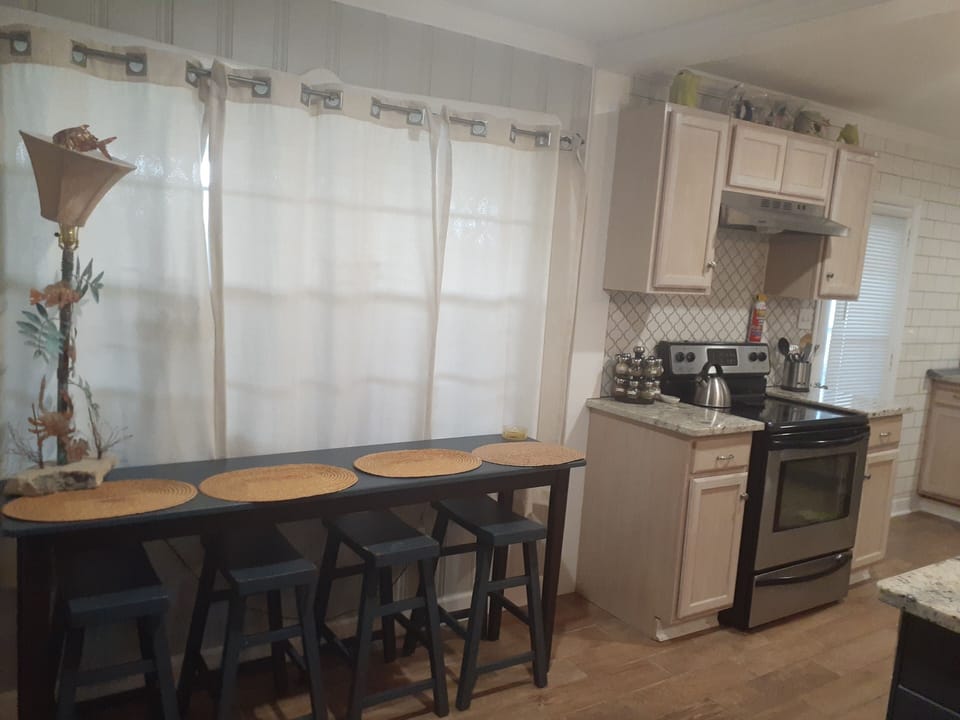 Eating area for 7 plus outdoor dining off kitchen that seats 4 