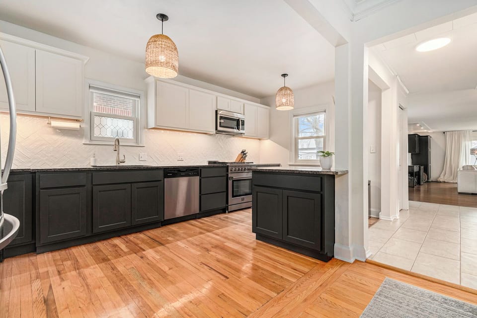 A fully-equipped gourmet kitchen includes a gas chef's stove and convection oven