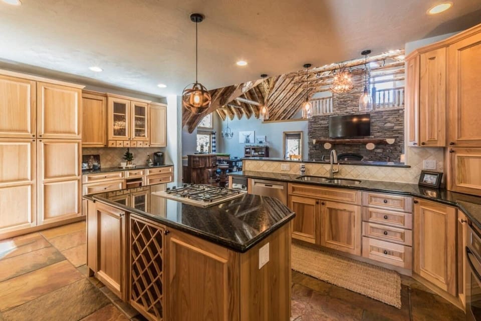 Huge kitchen that is fully stocked with everything you need! Kitchen is open to living area, dining, and breakfast area. 