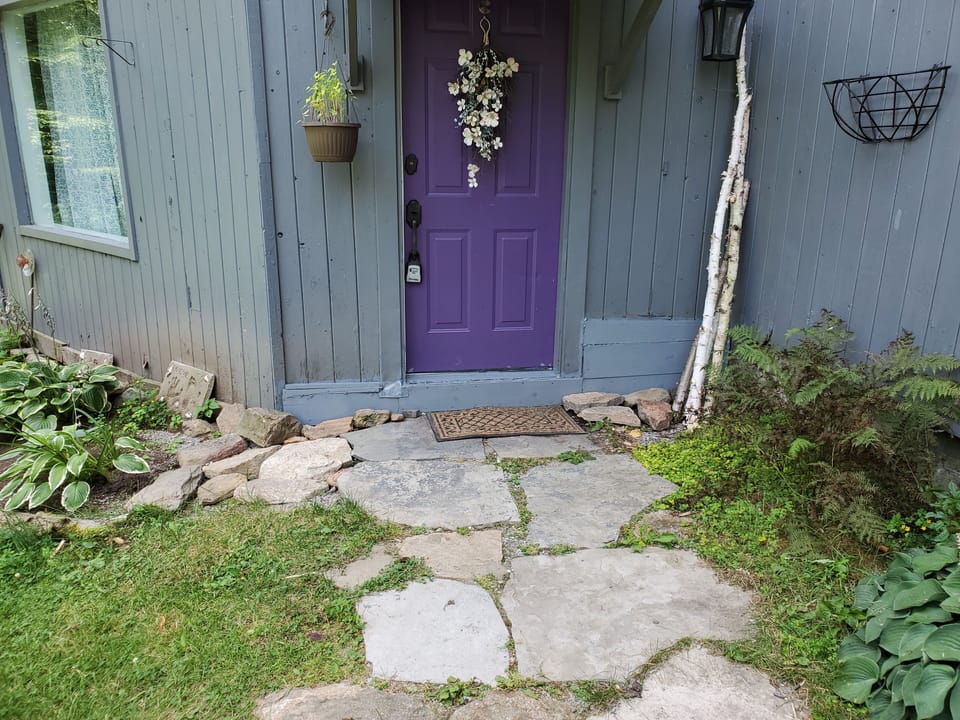 Your own entrance with well lit path.  Your own parking space/