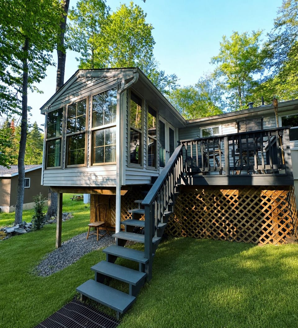 Back of the house - sunroom. Back patio. 