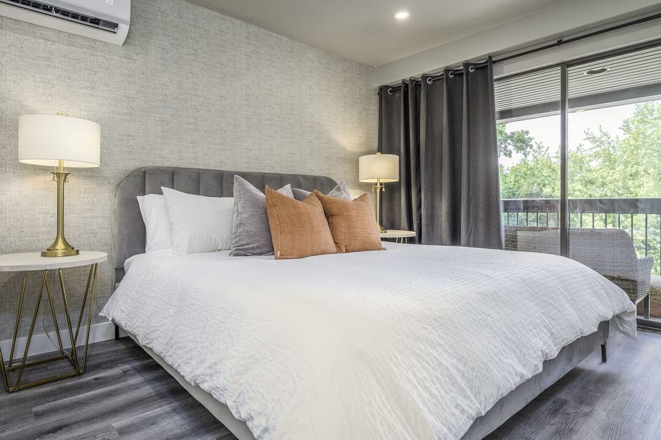 King bed with floor to ceiling view