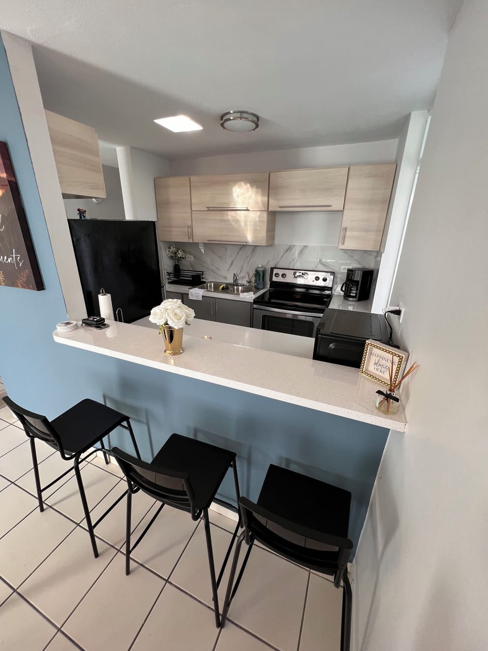 Kitchen overlooking dining area and living room