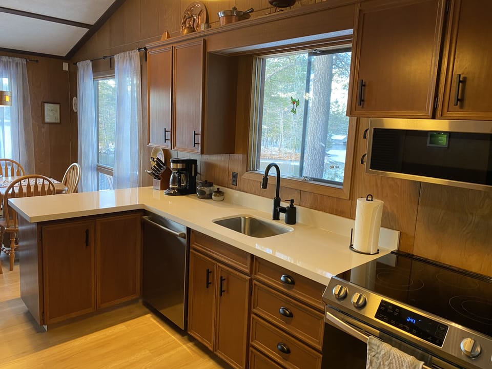 KITCHEN (Fully Equipped with New Appliances and Stone Countertop)