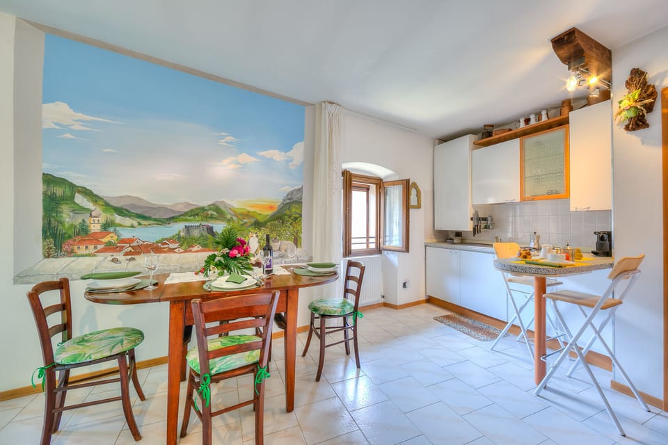 The living area with paintings on the walls