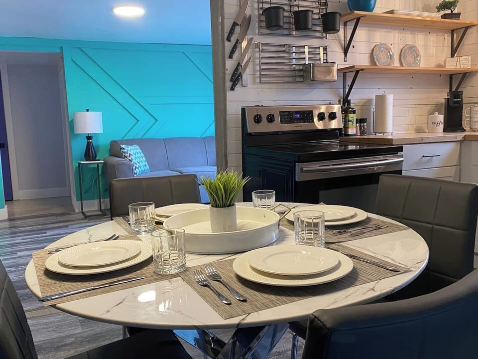 The table is set with attention to detail, featuring stylish table linens and tasteful decor for a delightful dining experience