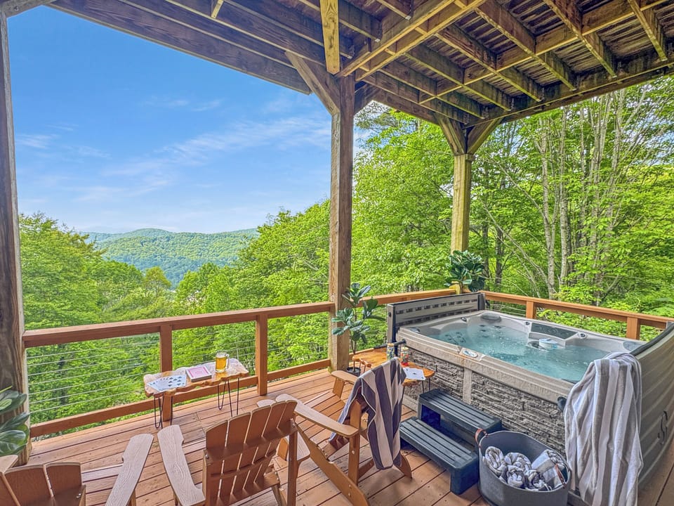 Step out from the game room to your private deck with a bubbling hot tub and cozy outdoor seating. Unwind after a day of fun, soak under the stars, or relax by the fire with mountain views as your backdrop—your perfect retreat awaits.