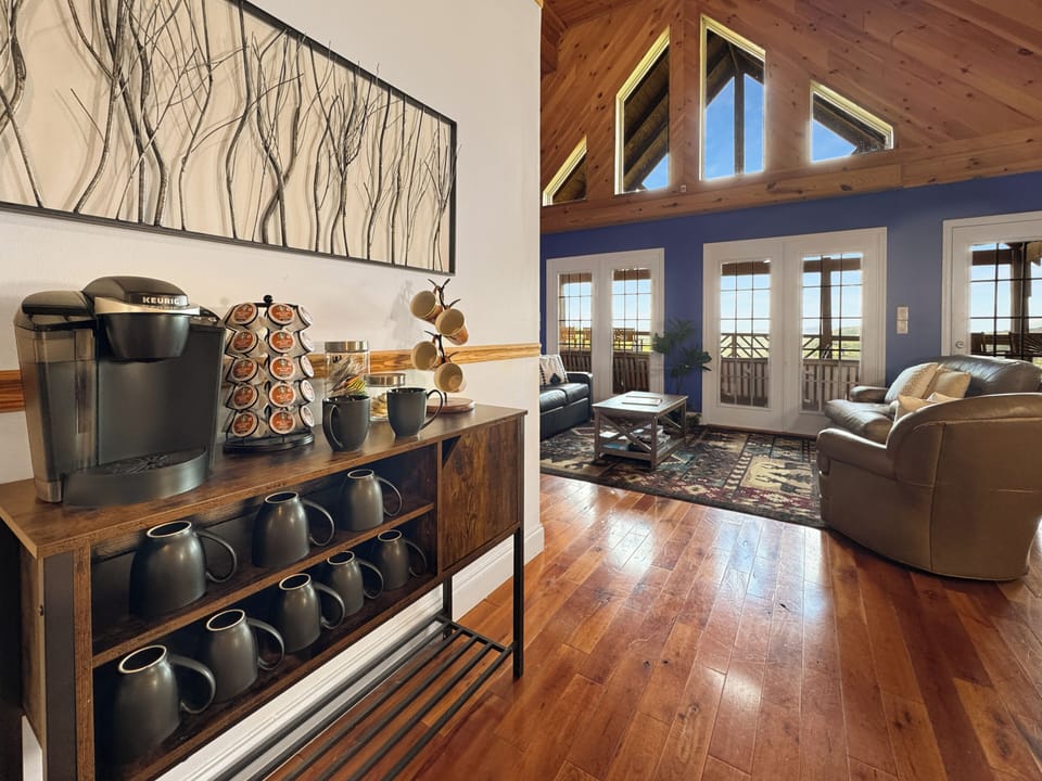 Start your mornings right at the cozy coffee bar just off the kitchen—fully stocked and ready for your favorite brew. It’s the perfect spot to sip, relax, and plan your day before heading out to explore or unwind at home. 