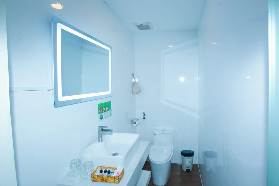 Hair dryer, slippers, towels, soap