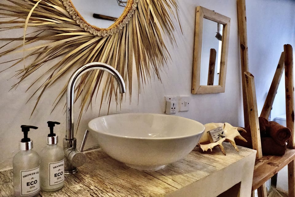 Luxury Condo | Bathroom | Shower, rainfall showerhead, hair dryer, slippers