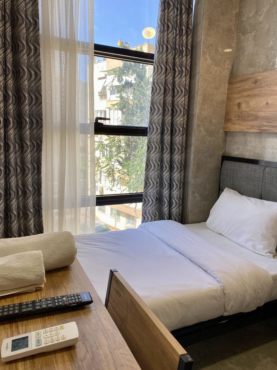 Classic Single Room | Minibar, in-room safe, desk, iron/ironing board