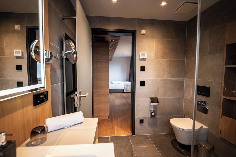 Exclusive Single Room, 1 Twin Bed, Slope side | Bathroom | Hair dryer, towels, soap, shampoo