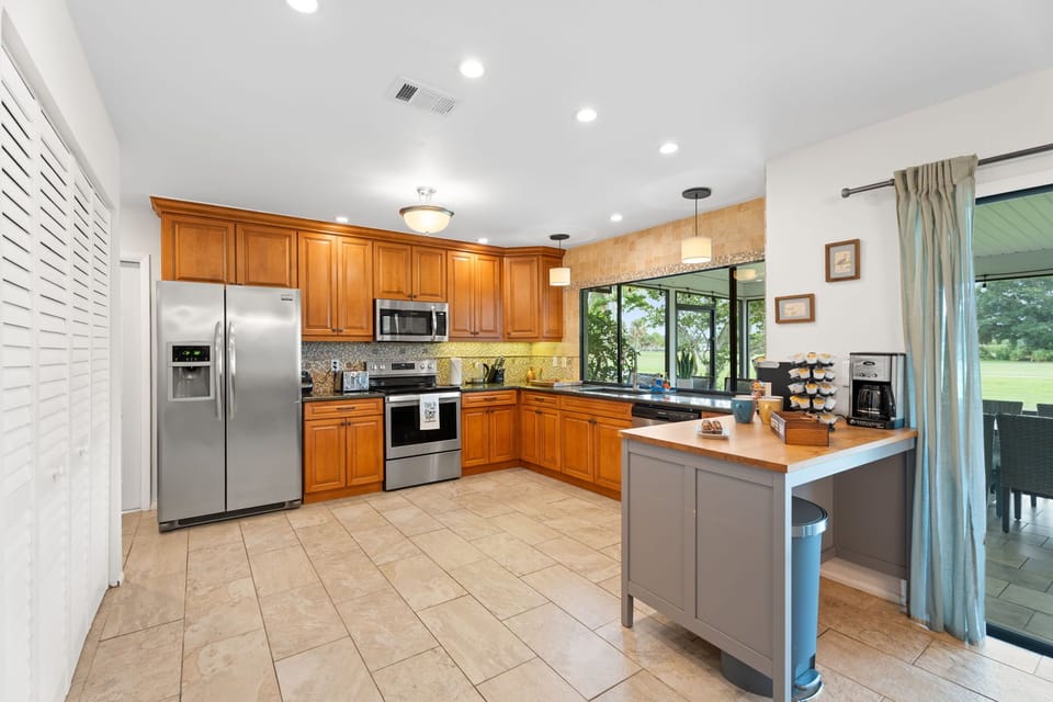 Elegant Open Kitchen with Golf Views and Premium Amenities