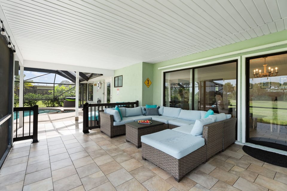 Elegant Screened Lounge with Golf Views – Designed for Luxury Living