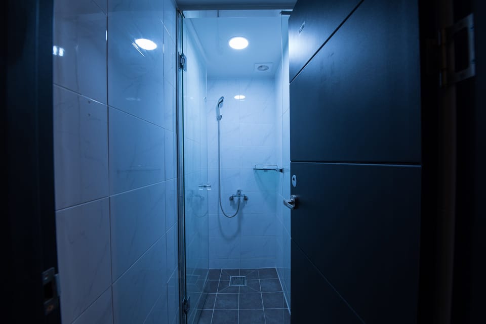 Shower, free toiletries, hair dryer, slippers