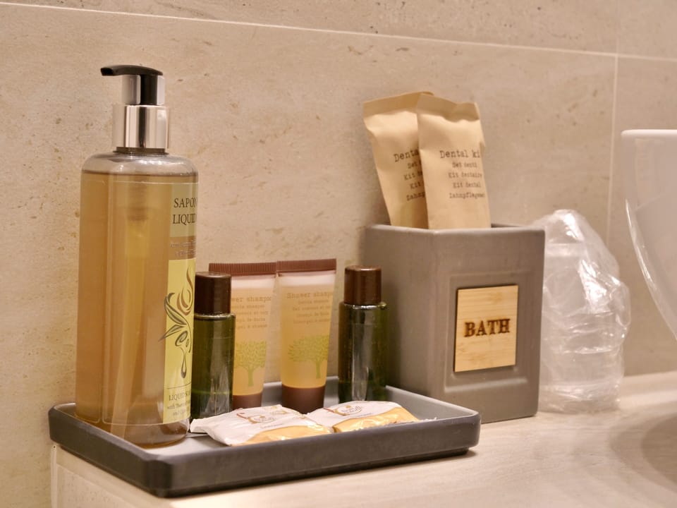Rainfall showerhead, free toiletries, hair dryer, slippers