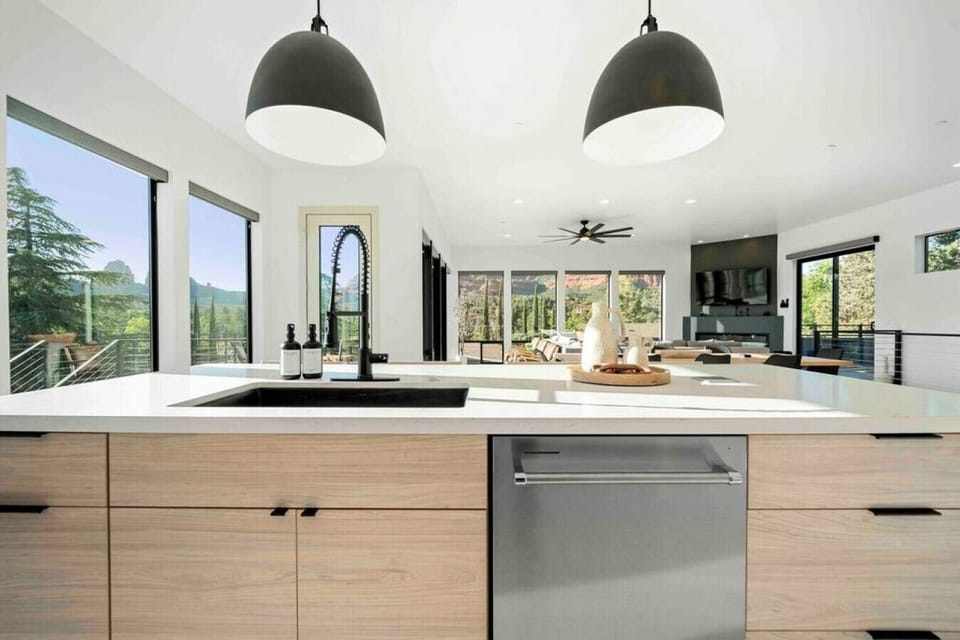 Kitchen island counter with sink and dishwasher