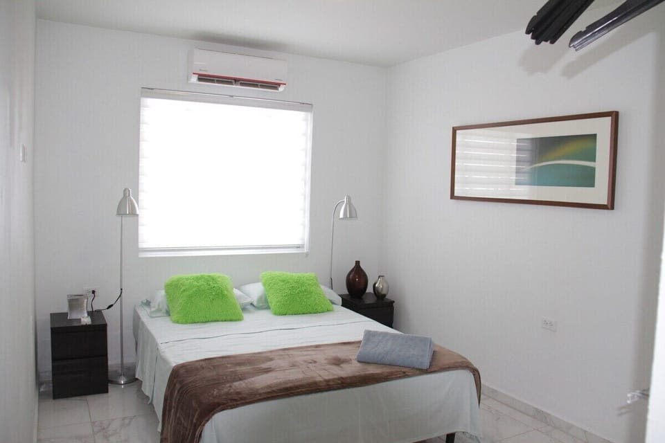 Spacious bedroom with a queen size bed