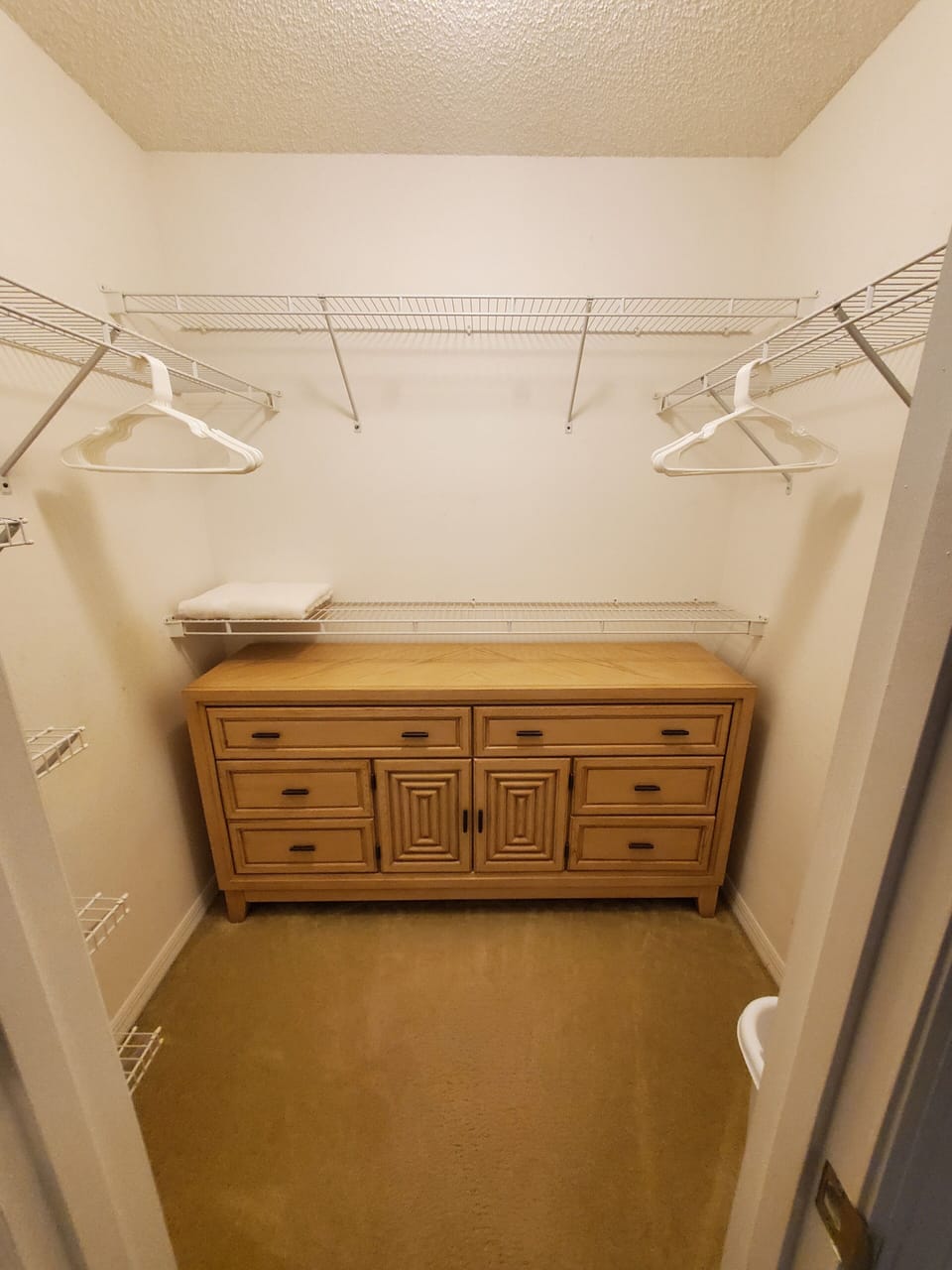 Primary bedroom, walk-in closet.